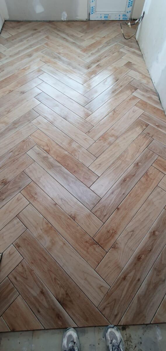 Détail pose de parquet à chevrons à Valenciennes par Banari Renov